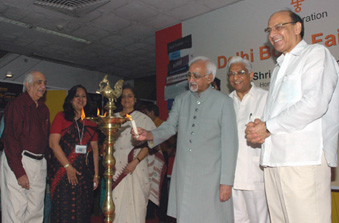 The Vice President, Shri Mohd. Hamid Ansari lighting the lamp to inaugurate the ‘Delhi Book Fair’, in New Delhi on August 30, 2008.